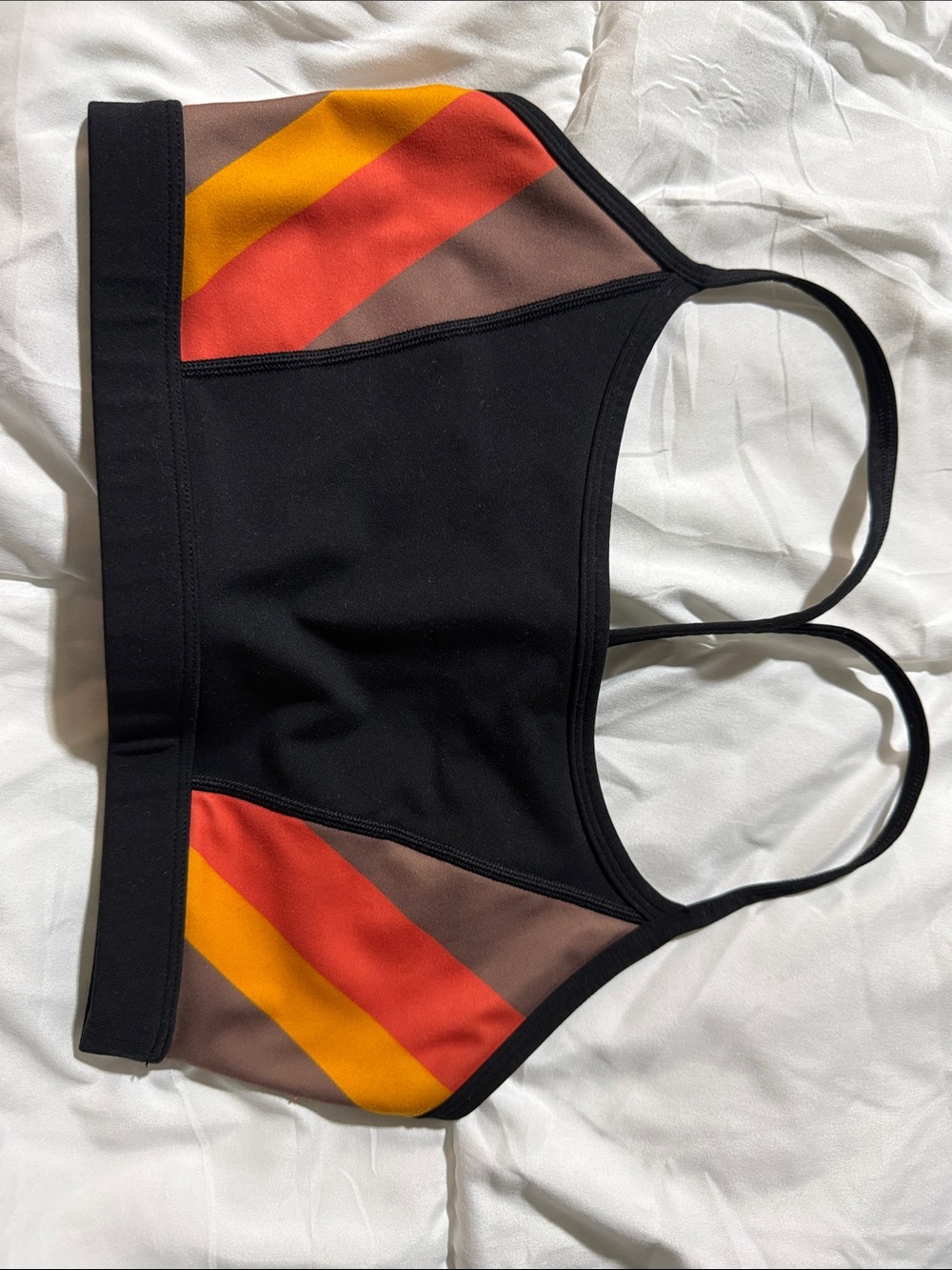 Spiritual Gangster Black Sports Bra with Red and Yellow Diagonal Panels